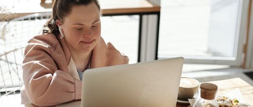 A woman working away on her laptop